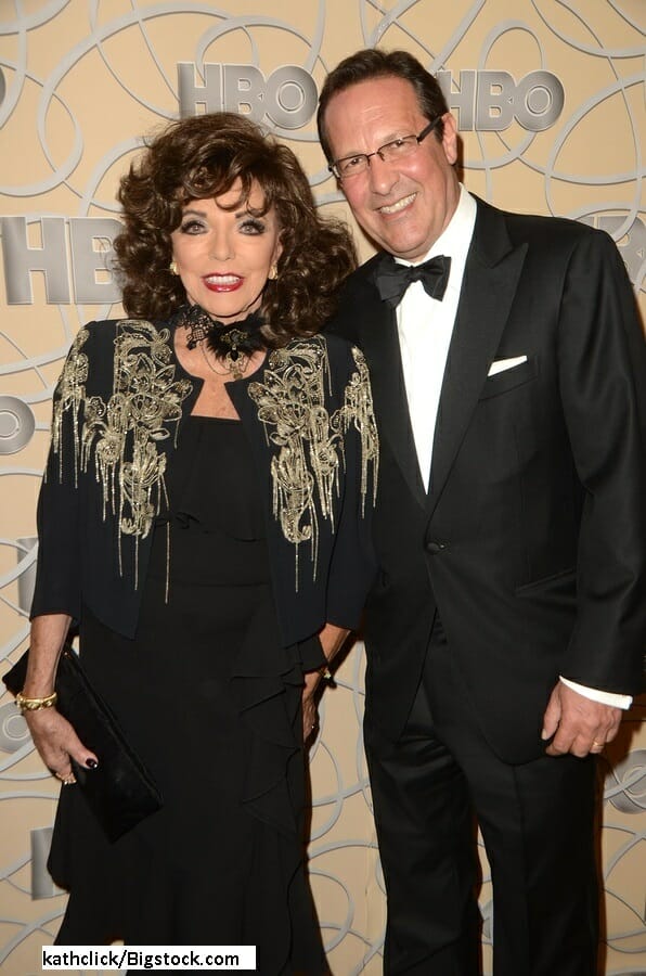 Percy Gibson and Joan Collins